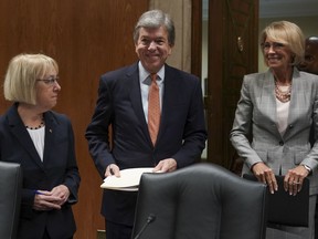 Education Secretary Betsy DeVos, right, Senate Subcommittee on Labor, Health and Human Services, Education, and Related Agencies Appropriations chairman Sen. Roy Blunt, R-Mo., center, and ranking member Sen. Patty Murray, D-Wash., arrive for a Senate Subcommittee on Labor, Health and Human Services, Education, and Related Agencies Appropriations hearing to review the Fiscal Year 2019 funding request and budget justification for the U.S. Department of Education on Capitol Hill in Washington, Tuesday, June 5, 2018.