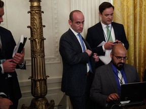 White House senior adviser Stephen Miller waits for the arrival of President Donald Trump to the National Space Council in the East Room of the White House, Monday, June 18, 2018, in Washington.