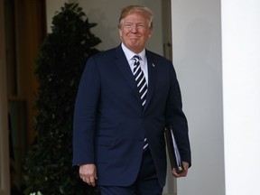 President Donald Trump arrives for a bill signing ceremony for the "VA Mission Act" in the Rose Garden of the White House, Wednesday, June 6, 2018, in Washington. The bill will expand private care for veterans as an alternative to the troubled Veterans Affairs health system.