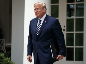 President Donald Trump arrives for a bill signing ceremony for the "VA Mission Act" in the Rose Garden of the White House, Wednesday, June 6, 2018, in Washington.