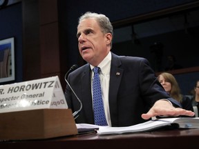 Department of Justice Inspector General Michael Horowitz testifies before a House Committee on the Judiciary and House Committee on Oversight and Government Reform joint hearing on'Oversight of the FBI and DOJ Actions in Advance of the 2016 Election', on Capitol Hill in Washington, Tuesday, June 19, 2018.