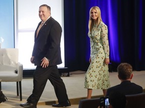 Secretary of State Mike Pompeo, left, walks in with Ivanka Trump, the daughter and assistant to President Donald Trump, during an event to announce the 2018 Trafficking in Persons Report (TIP) ceremony at the US State Department in Washington, Thursday, June 28, 2018.