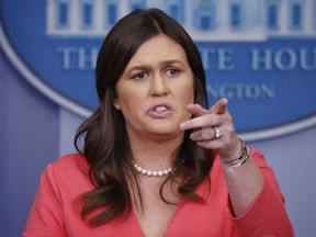 White House press secretary Sarah Huckabee Sanders gestures while speaking to the media during the daily briefing in the Brady Press Briefing Room of the White House, Monday, June 18, 2018.