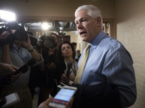 House Rules Committee Chairman Pete Sessions, R-Texas, answers questions from reporters as House Republicans try to bridge their party's internal struggle over immigration at a closed-door meeting on Capitol Hill in Washington, Thursday, June 7, 2018. Top Republicans want to head off an election-year showdown that divides the party.