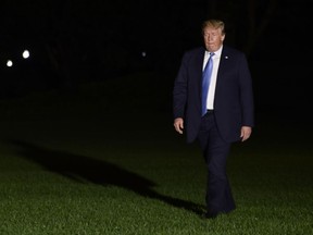 President Donald Trump walks across the South Lawn of the White House in Washington, Saturday, June 23, 2018, after returning from a trip to Las Vegas.