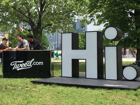 Representatives for Tweed Inc., a licenced producer of cannabis, mingle with concertgoers at the Field Trip music festival in Toronto on Sunday, June 3, 2018.