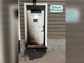 Damage to a door of a mosque in Edson, Alta. is shown in a handout photo.