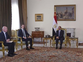 In this Thursday, June 21, 2018 photo, provided by Egypt's state news agency, MENA, Egyptian President Abdel-Fattah el-Sissi, center, meets with President Donald  Trump's son-in-law and senior adviser Jared Kushner, second left, and Mideast envoy Jason Greenblatt on the latest stop in a regional tour to discuss a blueprint for an Israeli-Palestinian peace deal, in Cairo, Egypt. (MENA via AP)
