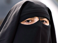 A woman wears a niqab in Montreal.