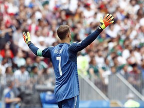 Germany goalkeeper Manuel Neuer gestures during the group F match between Germany and Mexico at the 2018 soccer World Cup in the Luzhniki Stadium in Moscow, Russia, Sunday, June 17, 2018.