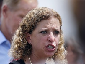 In this Tuesday, June 19, 2018 photo, U.S. Rep. Debbie Wasserman Schultz, D-Fla., speaks during a news conference at the Homestead Temporary Shelter for Unaccompanied Children on in Homestead, Fla. The congresswoman and U.S. Sen. Bill Nelson, D-Fla., were denied access to the facility.