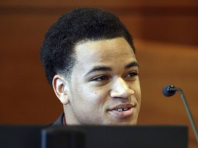 FILE- In this May 11, 2018 file photo Zachary Cruz testifies during his hearing at the Broward County Courthouse in Fort Lauderdale, Fla. The younger brother of the Florida school shooting suspect launched an anti-bullying campaign Thursday, June 14 saying he witnessed bullying against Nikolas Cruz that may have been a key factor a role in the Feb. 14 massacre at Marjory Stoneman Douglas High School.