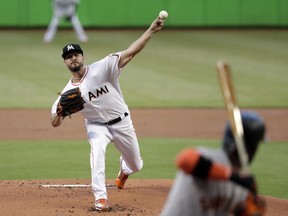 Miami Marlins starting pitcher Caleb Smith delivers during the first inning of the team's baseball game against the San Francisco Giants, Wednesday, June 13, 2018, in Miami.