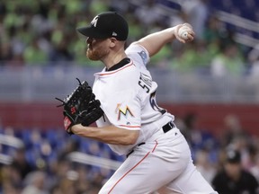 Miami Marlins starting pitcher Dan Straily delivers during the first inning of a baseball game against the San Francisco Giants, Thursday, June 14, 2018, in Miami.