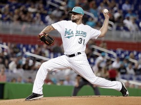 Miami Marlins starting pitcher Caleb Smith (31) delivers during the first inning of a baseball game against the San Diego Padres, Friday, June 8, 2018, in Miami.