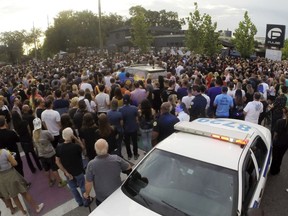 People gather as the Pulse nightclub marks the solemn 2 year anniversary of the shooting, Tuesday, June 12, 2018. Survivors and victims' relatives are marking the second anniversary of the Pulse nightclub shooting with a remembrance ceremony, a run, art exhibits and litigation.