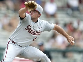 Florida State's Drew Parrish pitches against Mississippi State during an NCAA college baseball tournament regional game in Tallahassee, Fla., on Saturday, June 2, 2018.
