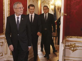 FILE - In this Dec. 18, 2017 file photo Austrian President Alexander Van Der Bellen, new Chancellor Sebastian Kurz and new Vice Chancellor Heinz-Christian Strache, from left, arrive for the swearing-in ceremony of the new Austrian government led by a conservative and a nationalist party in Vienna, Austria.