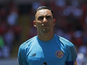 FILE - In this June 3, 2018 file photo Costa Rica goalkeeper Keylor Navas listens to the national anthems before a friendly soccer match between Costa Rica and Northern Ireland in San Jose, Costa Rica.