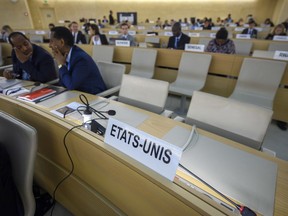 The US name sign is photographed one day after the United States announced its withdrawal at the 38th session of the UN Human Rights Council at the UN headquarters in Geneva on Wednesday. June 20, 2018.