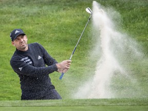 Spain's Sergio Garcia plays a ball during the BMW International Open in Pulheim, western Germany, Thursday, June 21, 2018.