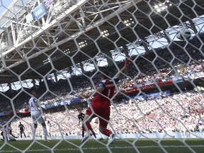 Argentina's Sergio Aguero scores the opening goal during the group D match between Argentina and Iceland at the 2018 soccer World Cup in the Spartak Stadium in Moscow, Russia, Saturday, June 16, 2018.