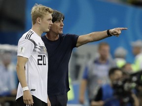 Germany head coach Joachim Loew instructs Julian Brandt during the group F match between Germany and Sweden at the 2018 soccer World Cup in the Fisht Stadium in Sochi, Russia, Saturday, June 23, 2018.