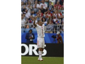 Serbia's Aleksandar Kolarov celebrates after scoring the opening goal during the group E match between Costa Rica and Serbia at the 2018 soccer World Cup in the Samara Arena in Samara, Russia, Sunday, June 17, 2018.