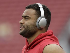 FILE - In this Dec. 24, 2017, file photo, San Francisco 49ers defensive end Solomon Thomas warms up before the team's NFL football game against the Jacksonville Jaguars in Santa Clara, Calif. Thomas will return to his family's home in the Dallas area this weekend to take part Saturday in The Out of the Darkness Overnight Walk, which benefits the American Foundation for Suicide Prevention. Thomas has already raised more than $27,000 for the cause.