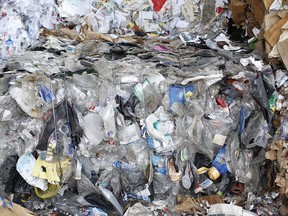 FILE - In this July 25, 2017 file photo, baled plastics await pickup for recycling inside the Athens-Clarke material recycling facility in Athens, Ga. A scientific study published Wednesday, June 20, 2018, said China's 2017 decision to stop accepting plastic waste from other countries is causing plastic to stockpile around the globe.