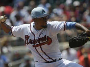 Atlanta Braves' Julio Teheran pitches against the San Diego Padres during the first inning of a baseball game Sunday June 17, 2018, in Atlanta.