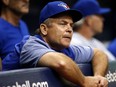 Toronto Blue Jays manager John Gibbons whistles from the dugout against the Tampa Bay Rays on June 12.