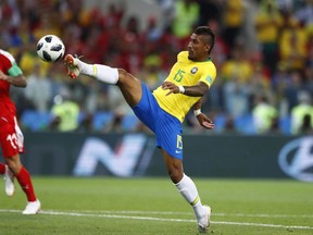 Brazil's Paulinho scores his side's opening goal during the group E match between Serbia and Brazil, at the 2018 soccer World Cup in the Spartak Stadium in Moscow, Russia, Wednesday, June 27, 2018.