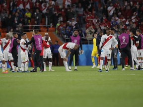 Peru players react after losing the group C match between France and Peru at the 2018 soccer World Cup in the Yekaterinburg Arena in Yekaterinburg, Russia, Thursday, June 21, 2018.