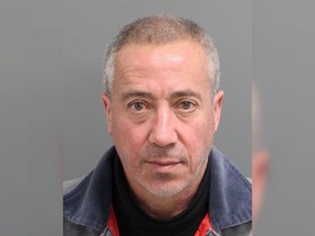 This undated file mug shot provided by the Wake City-County Bureau of Identification shows Christian Desgroux, 57, who's accused of pretending to be a U.S. Army general when he landed a chartered helicopter at a technology company in North Carolina in November 2017.