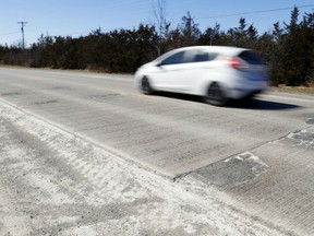 A car travels Highway 49 (not mentioned in the story) north of Picton, Ont. Saturday, March 24, 2018. A mother is facing charges after she allegedly drove her vehicle on a highway with her three-year-old on her lap steering the wheel.