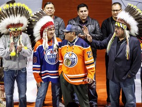 Fred Sasakamoose is honoured at the Edmonton Oilers' game against the Chicago Blackhawks on Dec. 29, 2017.