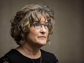 Sherri Garrett, an employee in Illinois House Speaker Michael Madigan's office, speaks at a news conference in Chicago, Wednesday, June 6, 2018, where she accused Madigan's chief of staff Timothy Mapes of mishandling allegations of sexual harassment and making inappropriate comments. She said Mapes was dismissive of harassment complaints on two occasions and made untoward comments to her and others in incidents from 2013 to just a few weeks ago.