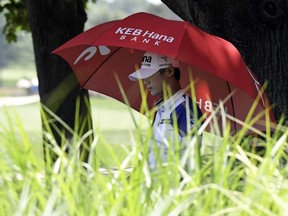 Sung Hyun Park, of South Korea, walks to the tee box on the second hole during the third round of the KPMG Women's PGA Championship golf tournament at Kemper Lakes Golf Club in Kildeer, Ill., Saturday, June 30, 2018.