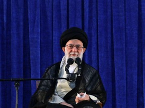 In this picture released by an official website of the office of the Iranian supreme leader, Supreme Leader Ayatollah Ali Khamenei attends a ceremony marking the 29th anniversary of the death of the late revolutionary founder Ayatollah Khomeini, at his mausoleum, just outside Tehran, Iran, Monday, June 4, 2018. Iran's top leader says anyone who fires one missile at his country "will be hit by 10" in response, but dismisses fears of war as "propaganda" by the West.