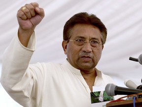 FILE - In this Monday, April 15, 2013 file photo, Pakistan's former President and military ruler Pervez Musharraf addresses his party supporters at his house in Islamabad, Pakistan. Pakistan's former military dictator Pervez Musharraf's party announced Saturday, June 9, 2018 that he will run for a seat in parliament in July 25 national elections.
