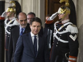 Italian premier-designate Giuseppe Conte arrives to speak at a press conference after meeting President Sergio Mattarella at the Quirinale Palace in Rome on May 31, 2018.