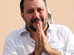 Italian Interior Minister Matteo Salvini gestures as he attends a local election rally in Cinisello Balsamo, near Milan, Italy, Sunday, June 17, 2018. Reports state that the 'Italian government will promote development initiatives in Africa, to stem immigration to Europe' Salvini said.