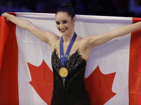 Kaetlyn Osmond celebrates after winning the 2018 women's figure skating world championship in Italy in March.