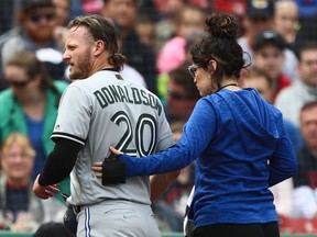 Toronto Blue Jays third baseman Josh Donaldson leaves a game against the Boston Red Sox on May 28.