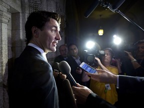 Prime Minister Justin Trudeau speaks to reporters before Question Period in the House of Commons on Parliament Hill in Ottawa on Monday, June 4, 2018.