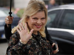 FILE - In this Wednesday, June 6, 2018 file photo, Israel's Prime Minister's wife Sara Netanyahu arrives for the meeting with French Finance Minister Bruno Le Maire at Bercy Economy Ministry, in Paris, France. Israeli prosecutors have charged Sara Netanyahu, the prime minister's wife, with a series of crimes including fraud and breach of trust. The Justice Ministry said in a statement on Thursday, June 21, 2018, that Sara Netanyahu stands accused of misusing public funds by fraudulently ordering hundreds of meals to the prime minister's official residence worth over $100,000 while falsely stating there were no cooks on staff.