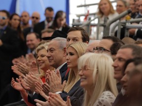 FILE - In this May 14, 2018 file photo, from left to right on front row, Israeli Prime Minister Benjamin Netanyahu, his wife Sara Netanyahu, Senior White House Advisor Jared Kushner, U.S. President's daughter Ivanka Trump, and other dignitaries, attend the opening ceremony of the U.S. embassy in Jerusalem. When the United States recognized Jerusalem as Israel's capital, Israelis hoped other countries would follow suit. Instead, the move has created a backlash. The Eurovision song contest has become the latest battleground between Israel and boycott activists, threatening the contested city's hopes of hosting the 2019 Eurovision song contest.