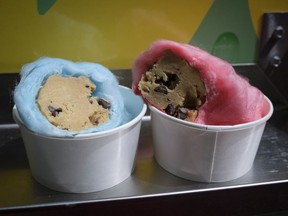 Samples cookie dough burritos, made of cookie dough wrapped in candy floss, that will be available at this year's Calgary Stampede in Calgary, Tuesday, June 5, 2018.