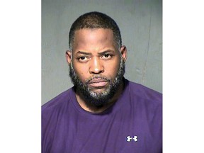 FILE - This undated file photo provided by the Maricopa County Sheriff's Department shows Abdul Malik Abdul Kareem. Kareem, convicted of helping to plot a 2015 attack on a Prophet Muhammad cartoon contest in suburban Dallas, is seeking a new trial. His lawyers argue prosecutors didn't reveal at trial that an undercover FBI agent who witnessed the shooting in Garland had communicated about the contest with an accused recruiter for the Islamic State.